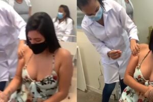 Enfermeira abraça jovem com medo de agulha de vacina; vídeo